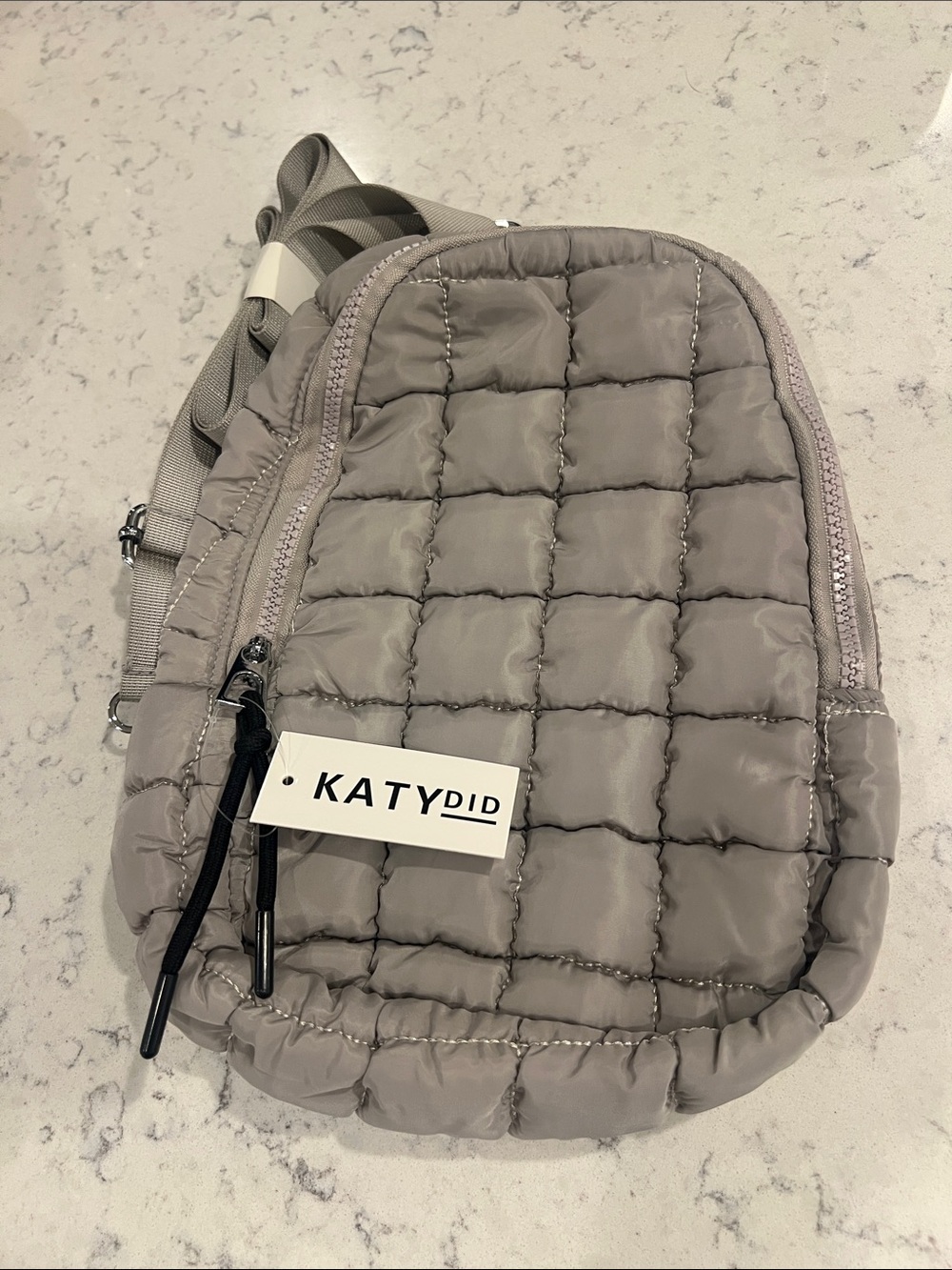 Katydid Quilted Sling Bag in Taupe Gray